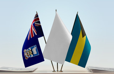 Flags of Falkland Islands and Bahamas with a white flag in the middle