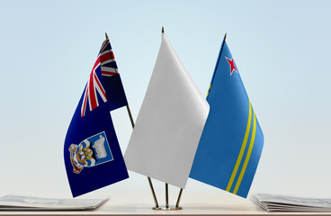 Flags of Falkland Islands and Aruba with a white flag in the middle