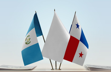 Flags of Guatemala and Panama with a white flag in the middle