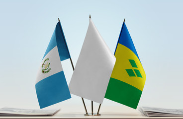 Flags of Guatemala and Saint Vincent and the Grenadines with a white flag in the middle