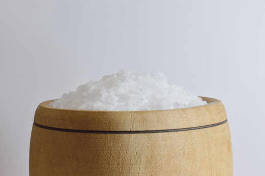 sea salt in wooden bowl close up