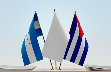 Flags of Honduras and Cuba with a white flag in the middle