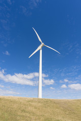 Fototapeta premium Wind turbine against clear blue sky