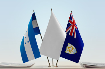 Flags of Honduras and Anguilla with a white flag in the middle