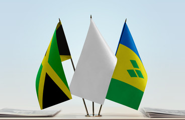 Flags of Jamaica and Saint Vincent and the Grenadines with a white flag in the middle