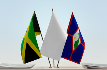 Flags of Jamaica and Sint Eustatius with a white flag in the middle