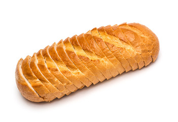 Sliced loaf of wheat bread on white background