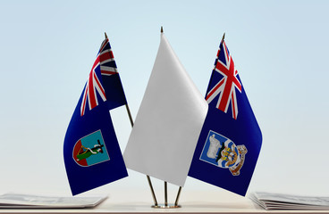 Flags of Montserrat and Falkland Islands with a white flag in the middle