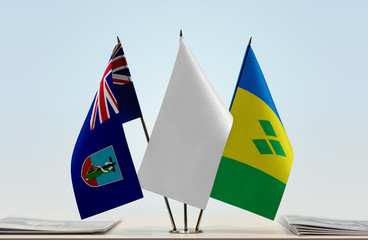 Flags of Montserrat and Saint Vincent and the Grenadines with a white flag in the middle