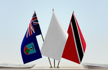 Flags of Montserrat and Trinidad and Tobago with a white flag in the middle