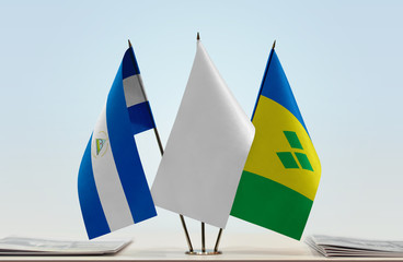 Flags of Nicaragua and Saint Vincent and the Grenadines with a white flag in the middle