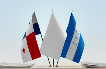 Flags of Panama and Honduras with a white flag in the middle