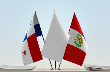 Flags of Panama and Peru with a white flag in the middle