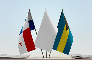 Flags of Panama and Bahamas with a white flag in the middle