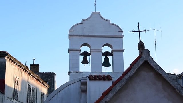 The old bells hanging and ringing  in a medieval church at Sibenik,Croatia.