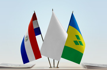 Flags of Paraguay and Saint Vincent and the Grenadines with a white flag in the middle