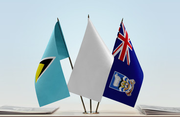Flags of Saint Lucia and Falkland Islands with a white flag in the middle