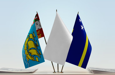 Flags of Saint Pierre and Miquelon and Curacao with a white flag in the middle