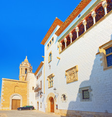 Fototapeta premium Sitges Town Hall and Church Parish of Saint Bartholomew and San