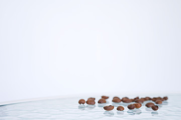 Roasted Coffee Beans background texture isolated on transparent glass background frame with copy space for text, macro.