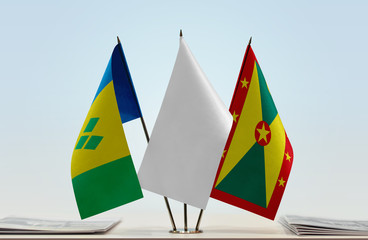 Flags of Saint Vincent and the Grenadines and Grenada with a white flag in the middle