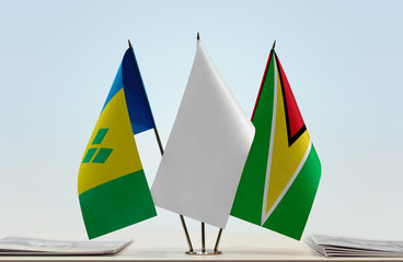 Flags of Saint Vincent and the Grenadines and Guyana with a white flag in the middle