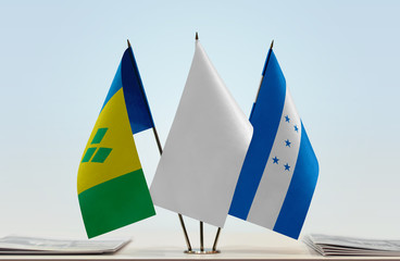 Flags of Saint Vincent and the Grenadines and Honduras with a white flag in the middle