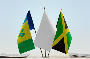 Flags of Saint Vincent and the Grenadines and Jamaica with a white flag in the middle