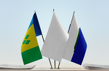 Flags of Saint Vincent and the Grenadines and Navassa Island with a white flag in the middle