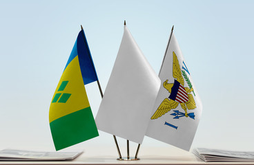Flags of Saint Vincent and the Grenadines and U.S. Virgin Islands with a white flag in the middle
