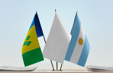Flags of Saint Vincent and the Grenadines and Argentina with a white flag in the middle