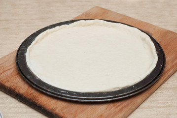 Homemade Pizza Cooking Process onWooden Board. Backstage of preparation. Process Step by Step. Pizza dough and ingredients.