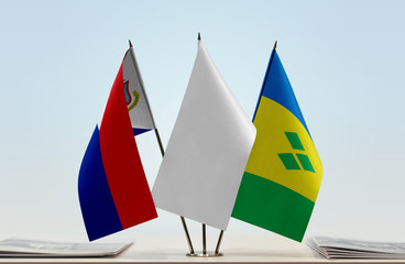 Flags of Sint Maarten and Saint Vincent and the Grenadines with a white flag in the middle