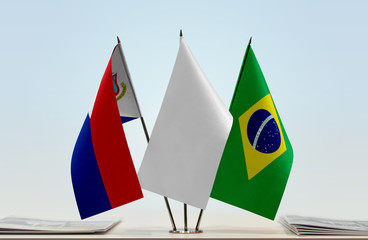 Flags of Sint Maarten and Brazil with a white flag in the middle