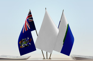 Flags of South Georgia and Sandwich and Navassa Island with a white flag in the middle