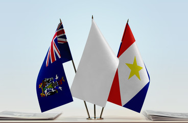 Flags of South Georgia and Sandwich and Saba with a white flag in the middle