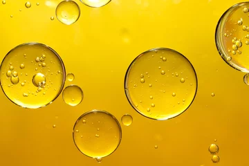 Fotobehang Macrofotografie golden yellow bubble oil