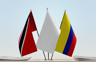 Flags of Trinidad and Tobago and Colombia with a white flag in the middle