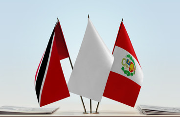 Flags of Trinidad and Tobago and Peru with a white flag in the middle