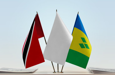 Flags of Trinidad and Tobago and Saint Vincent and the Grenadines with a white flag in the middle