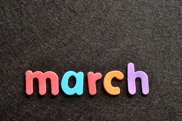 March on a black background
