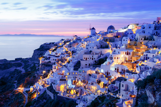 Brilliant sunset and the romantic town of Oia, Santorini, Greece