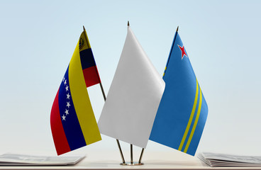 Flags of Venezuela and Aruba with a white flag in the middle