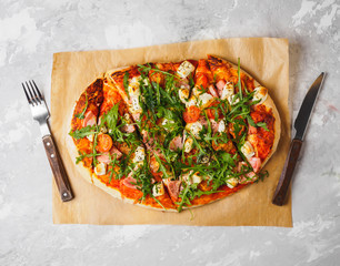 Hot homemade pizza on the grey background