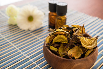 Herbal Oil and Dried Herb with flower