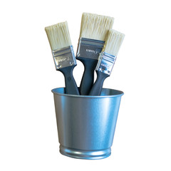 three paintbrushs in zinc bucket isolate with white background