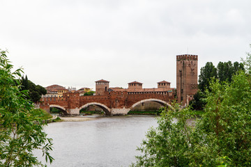Fototapeta na wymiar River and a fragment of the fortress in Verona. Italy 07.05,2017
