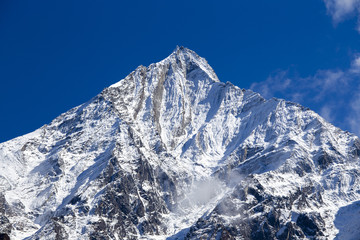 Mountain peak, Annapurna region, Nepal. Sunrise in the mountains. Beautiful landscape in Himalayas