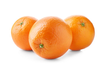 Juicy ripe oranges on white background