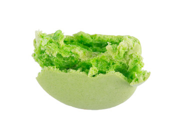 macaron green dessert broken, on white background